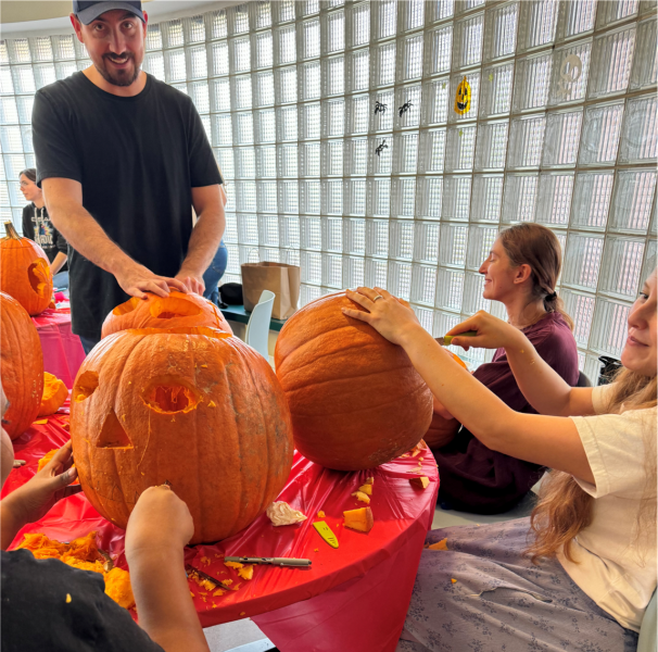 Ed Flaherty and friends carving their Halloween pumpkins